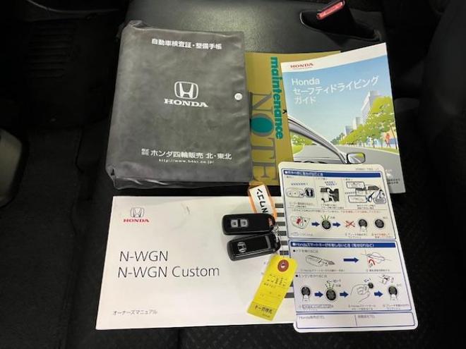 N-WGNカスタム　Ｇ－Ａパッケージ　あんしんパッケージ　本州仕入　禁煙車　ＷＡＫＯＳバリアスコーティング　シティーブレーキアシスト（衝突被害軽減システム）　社外１４インチＡＷ　社外１４ＡＷ＋スタッドレスタイヤ付　純正ハーフレザーシート　ＰＵＳＨスタート　スマートキー　クルーズコントロール　ミラーヒーター　ＨＩＤヘッドライト　プラズマクラスターオートエアコン 4WD 660 5Dr